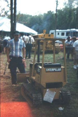 Ken Isley viewing a CAT D1-C  Dozer            photo credit:  (FAR-pic)